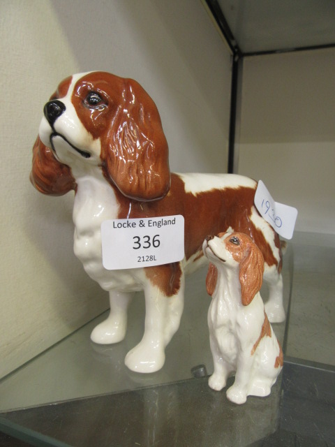 A Beswick model of a spaniel together with a small Beswick dog