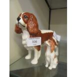 A Beswick model of a spaniel together with a small Beswick dog