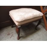 An early eighteenth century style oak stool on cabriole legs