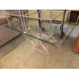 A modern perspex base glass top occasional table