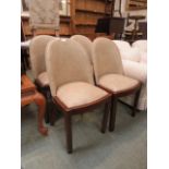 A set of four Art Deco dining chairs upholstered in a cream coloured Rexine