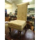 A 19th century walnut and upholstered prayer chair