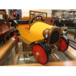 A modern painted child's tin pedal car modelled after "Brum" CONDITION REPORT: Has