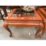 A Chinese part oak glass topped coffee table