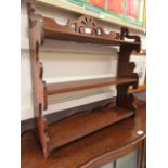 A set of Edwardian oak wall shelves