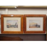 A pair of birdseye maple framed and glazed prints of sailing vessels
