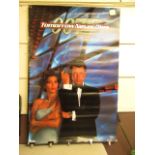 A large advertising poster for the James Bond film "Tomorrow Never Dies" (double sided vinyl)