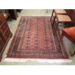 A hand woven Afghan rug,