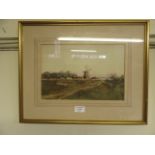 A framed and glazed watercolour of a windmill signed F Rider