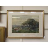 A framed and glazed watercolour of cattle in field signed G.F.