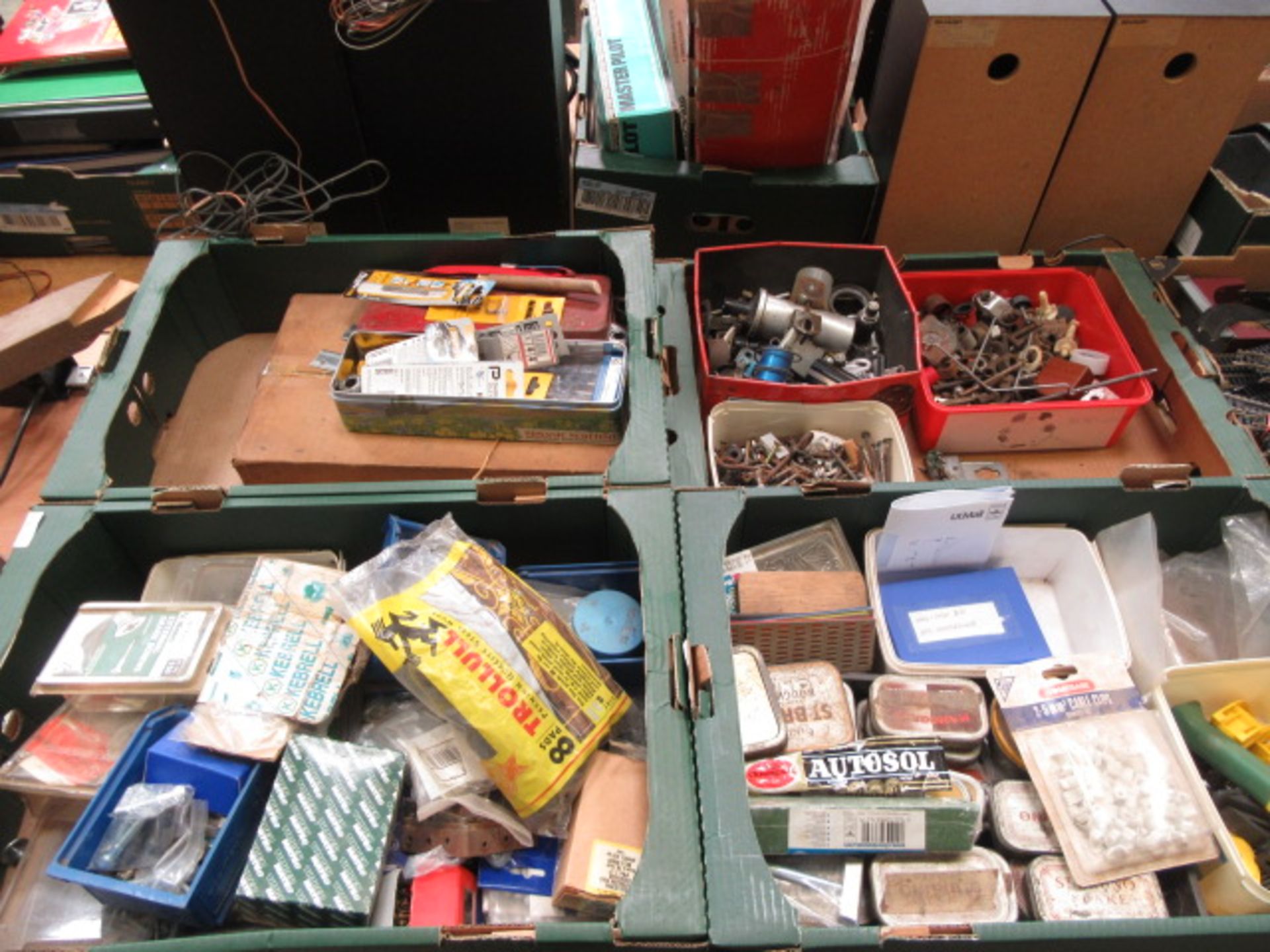 Four trays of hand tools, screws, nuts, bolts etc.
