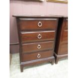 A Stag Minstrel bedside chest of four drawers