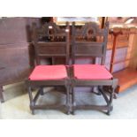 A pair of late 17th century style oak and inlaid back stools