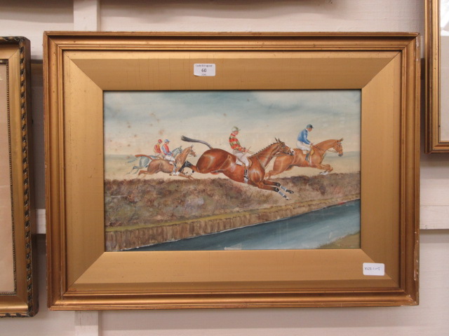 A framed and glazed watercolour of horse racing scene signed J.