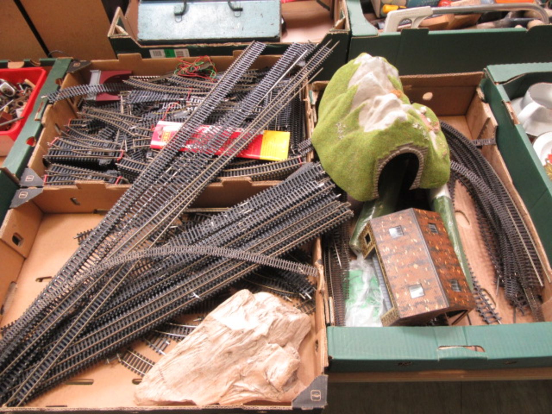 Three trays of railway track, buildings etc.