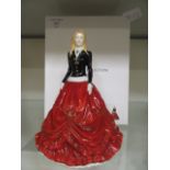 A boxed Royal Doulton figurine 'Festival Stroll' HN5854