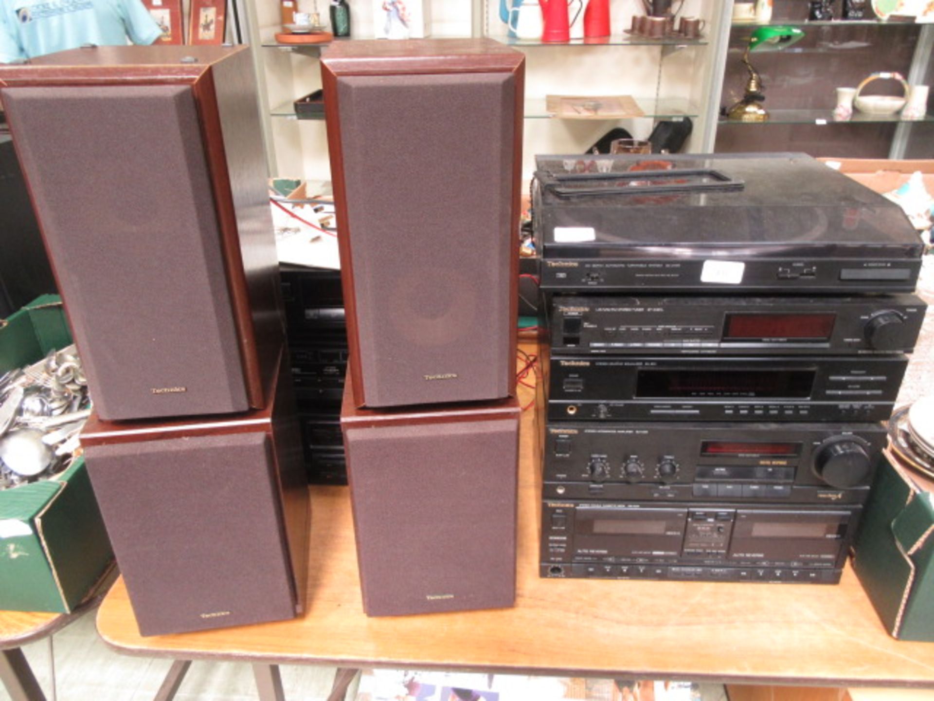 A Technics stacking music centre with turntable and speakers