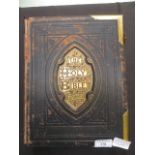 A brass bound leather illustrated Holy Bible