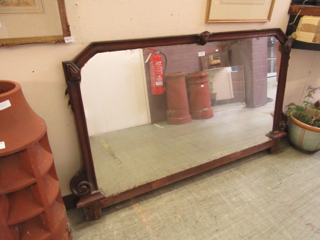 An Edwardian walnut famed mirror (part of another piece)