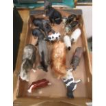 A tray of assorted ceramic and molded animals to include donkeys, dogs, bull etc.