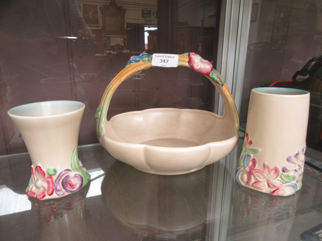 Three early 20th century Clarice Cliff items to include bowl and basket