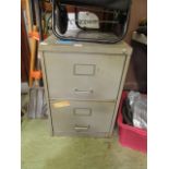 A metal two drawer filing cabinet