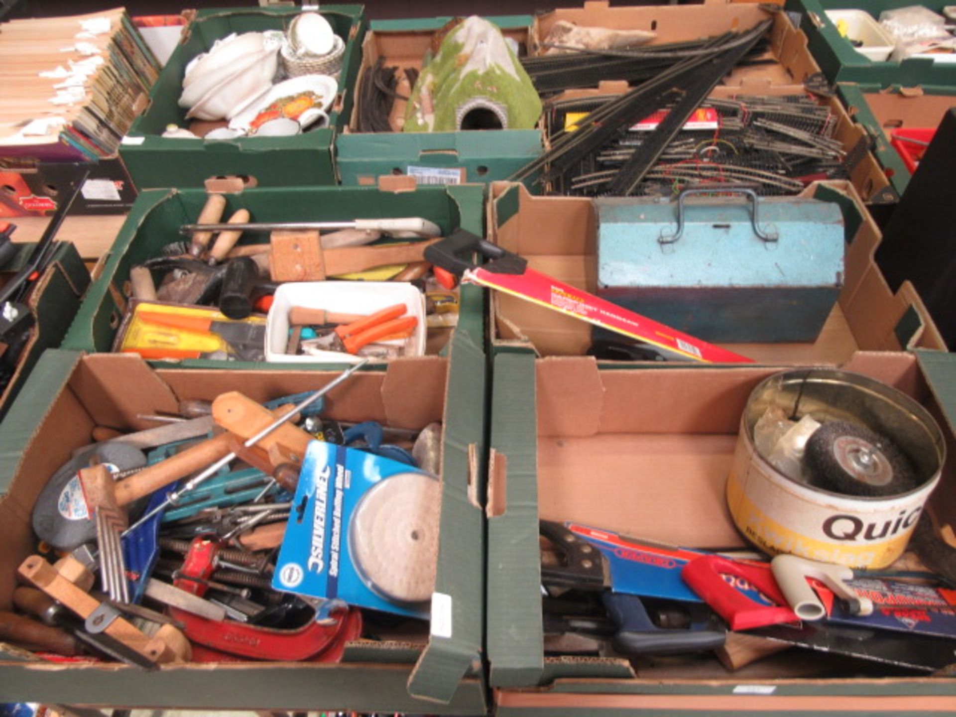Four trays of hand tools, tool boxes, saws etc.