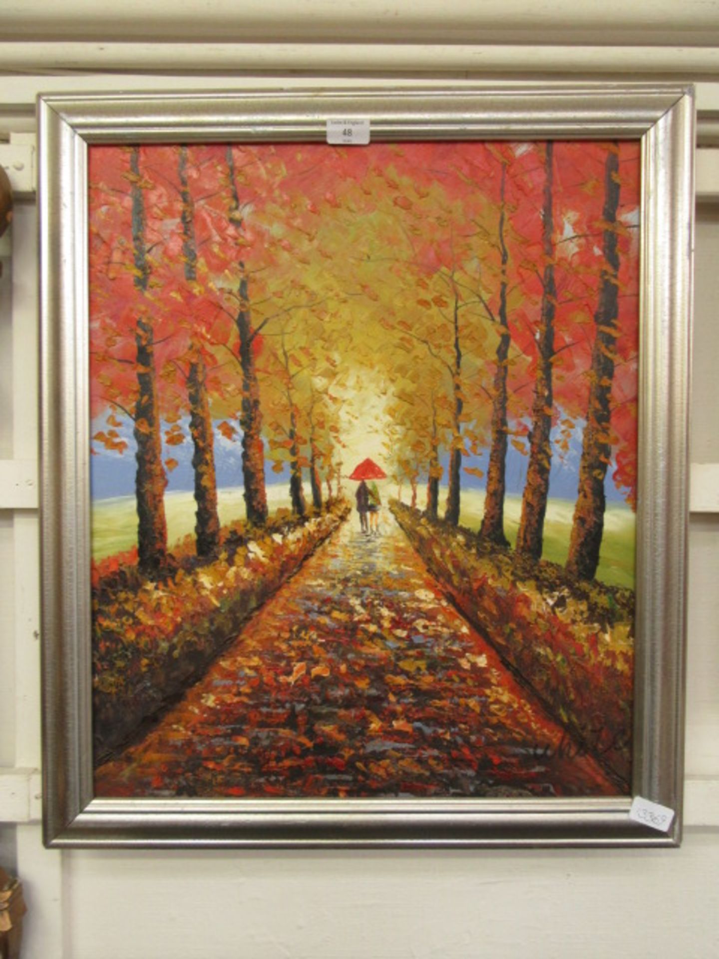 A framed oil on canvas of autumnal lane scene