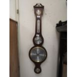 A reproduction mahogany banjo barometer by Sewills of Liverpool
