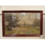 A framed and glazed watercolour of sheep scene