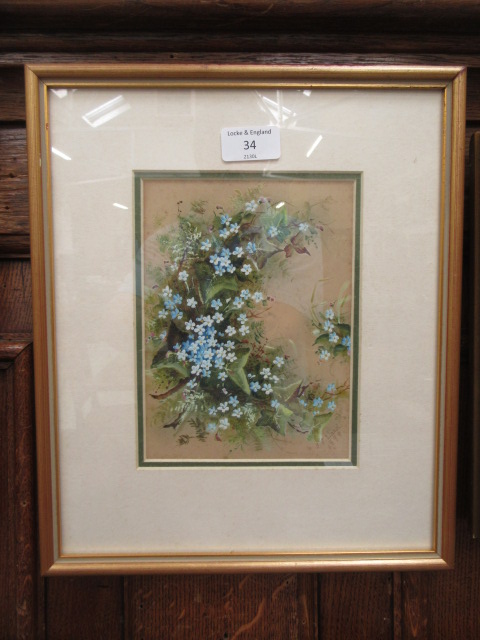 A framed and glazed watercolour of ivy and flowers signed H.E.
