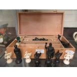 A modern chess set in wooden box