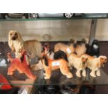 A selection of molded and ceramic dogs