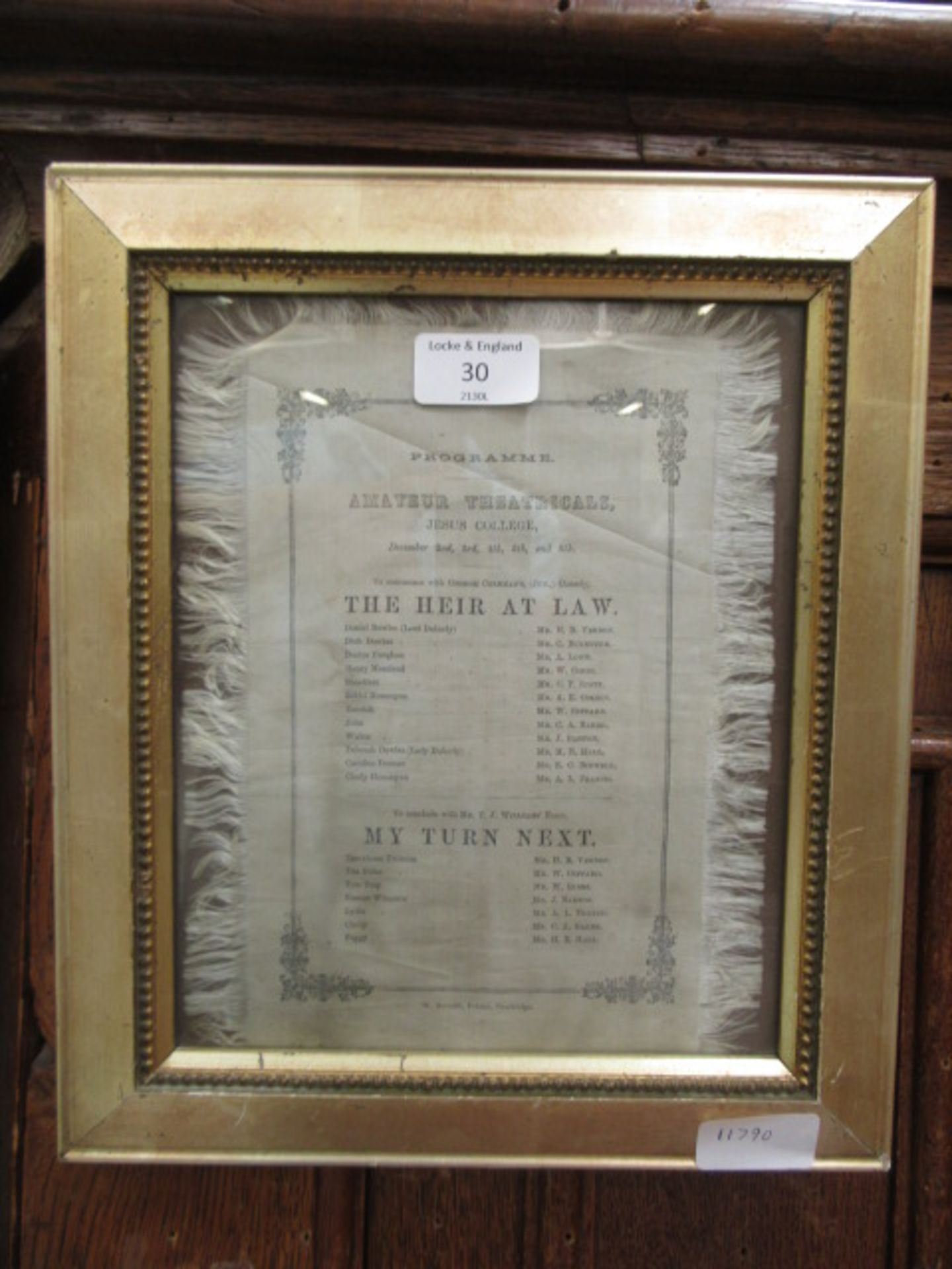 A framed and glazed silk programme for the amateur theatricals at Jesus college