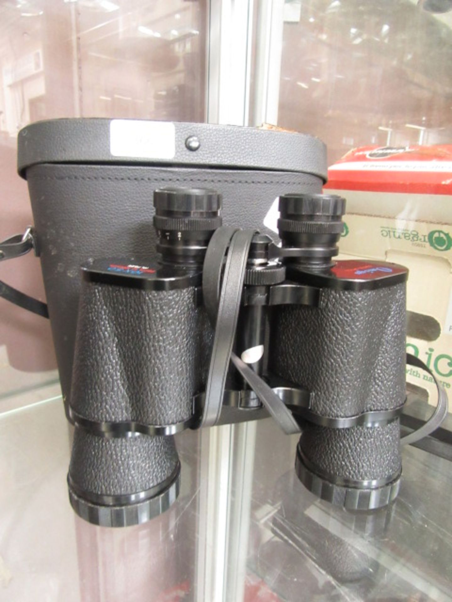 A cased set of 10 x 50 binoculars