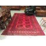 A hand woven Afghan rug,