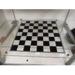 A modern Perspex chess board CONDITION REPORT: the size of the chess board is