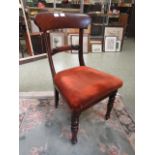 A late Victorian mahogany upholstered single chair