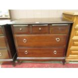 A Stag Minstrel chest of three short over two long drawers
