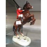 A Beswick model of huntsman on rearing horse No 868