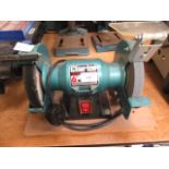 A bench top 6 inch Clark grinding machine was polishing mop