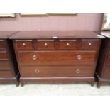 A Stag Minstrel sideboard with four small drawers over two long