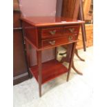 A reproduction mahogany hall table having two small drawers above one long drawer above open