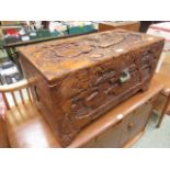 A Chinese style carved chamfer wood box