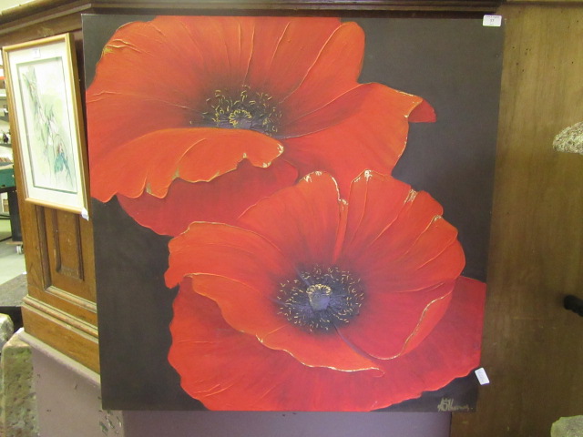 An oil on canvas of poppies signed bottom right