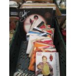 A tray containing LPs and 45rpm records by various artists to include Jason Donovan