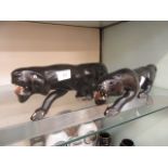 A pair of African ebony carved leopards