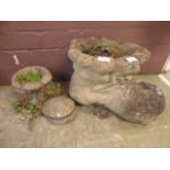 Two composite stone planters in the form of boots