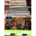 A tray containing a large quantity of LPs by various artists to include Cliff Richard,