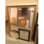 An ornate gilt framed bevel glass mirror along with two other mirrors